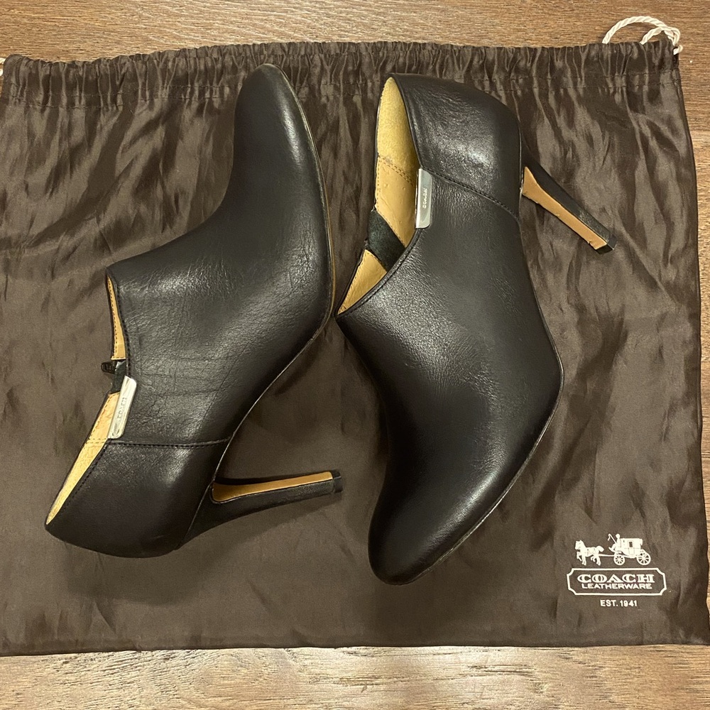 Coach black heeled booties.
